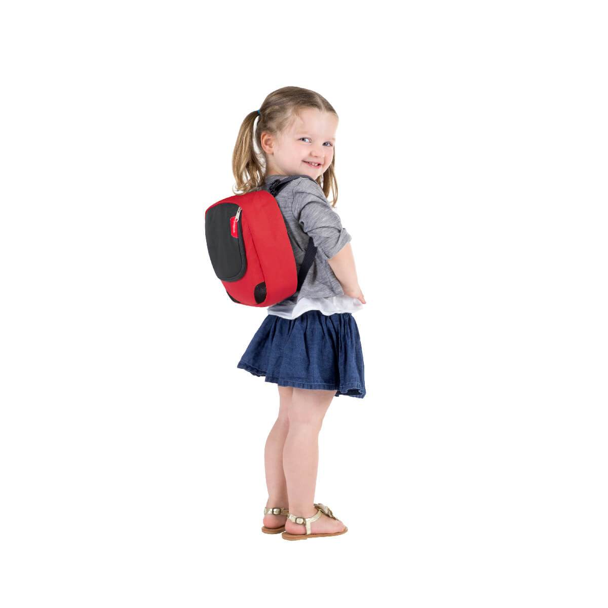 phil&teds parade detachable mini me backpack in chilli worn by a child_chilli