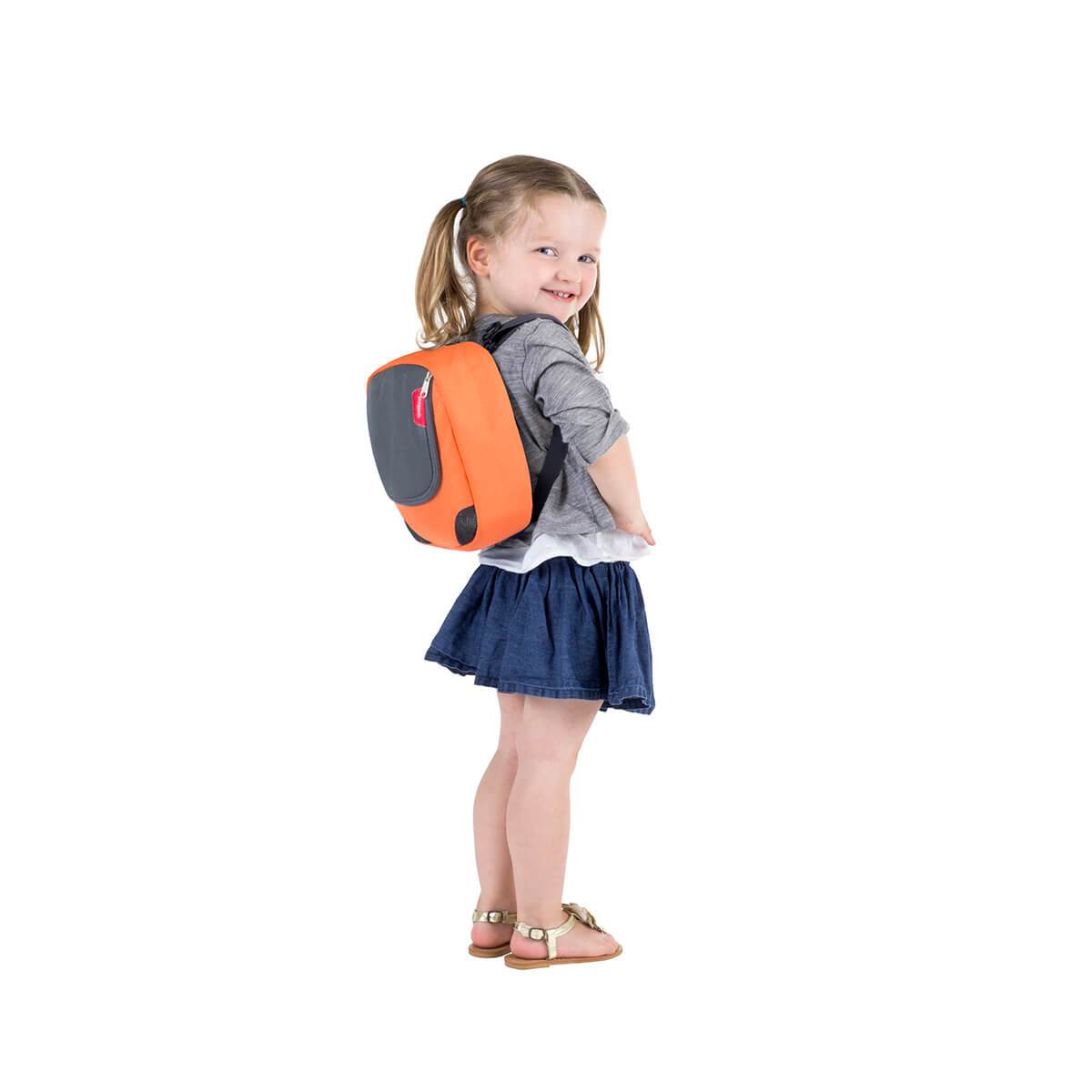 phil&teds parade detachable mini me backpack in orange worn by a child_orange